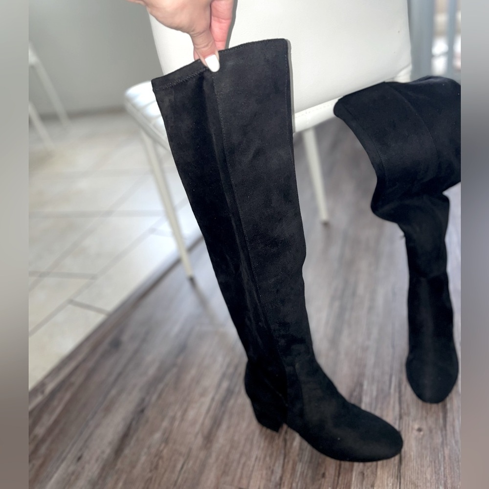 Saks Fifth Ave black suede, over the knew boots. 
Brand New with the box